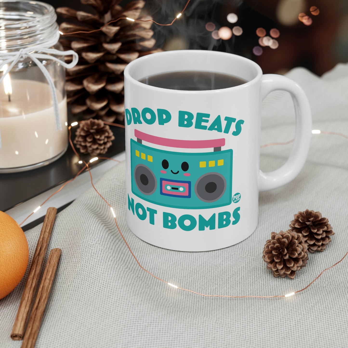 DROP BEATS NOT BOMBS COFFEE MUG