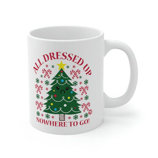 white mug with christmas trees with ornament and Kwaii sad eyes 