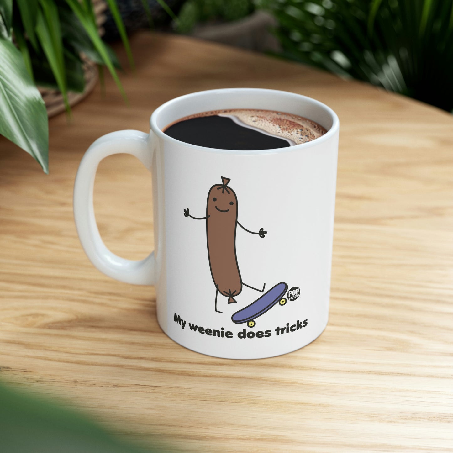 MY WEENIE DOES TRICKS COFFEE MUG