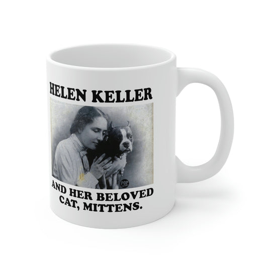 White ceramic mug featuring vintage photo of Helen Keller with her cat Mittens and caption – Pop Factory® funny historical meme cup
