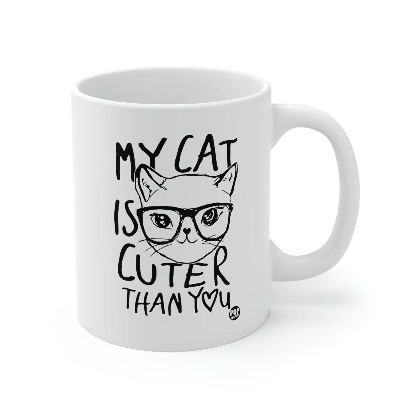White ceramic mug with cat face illustration and “My Cat Is Cuter Than You” text – Pop Factory® funny cat lover coffee cup
