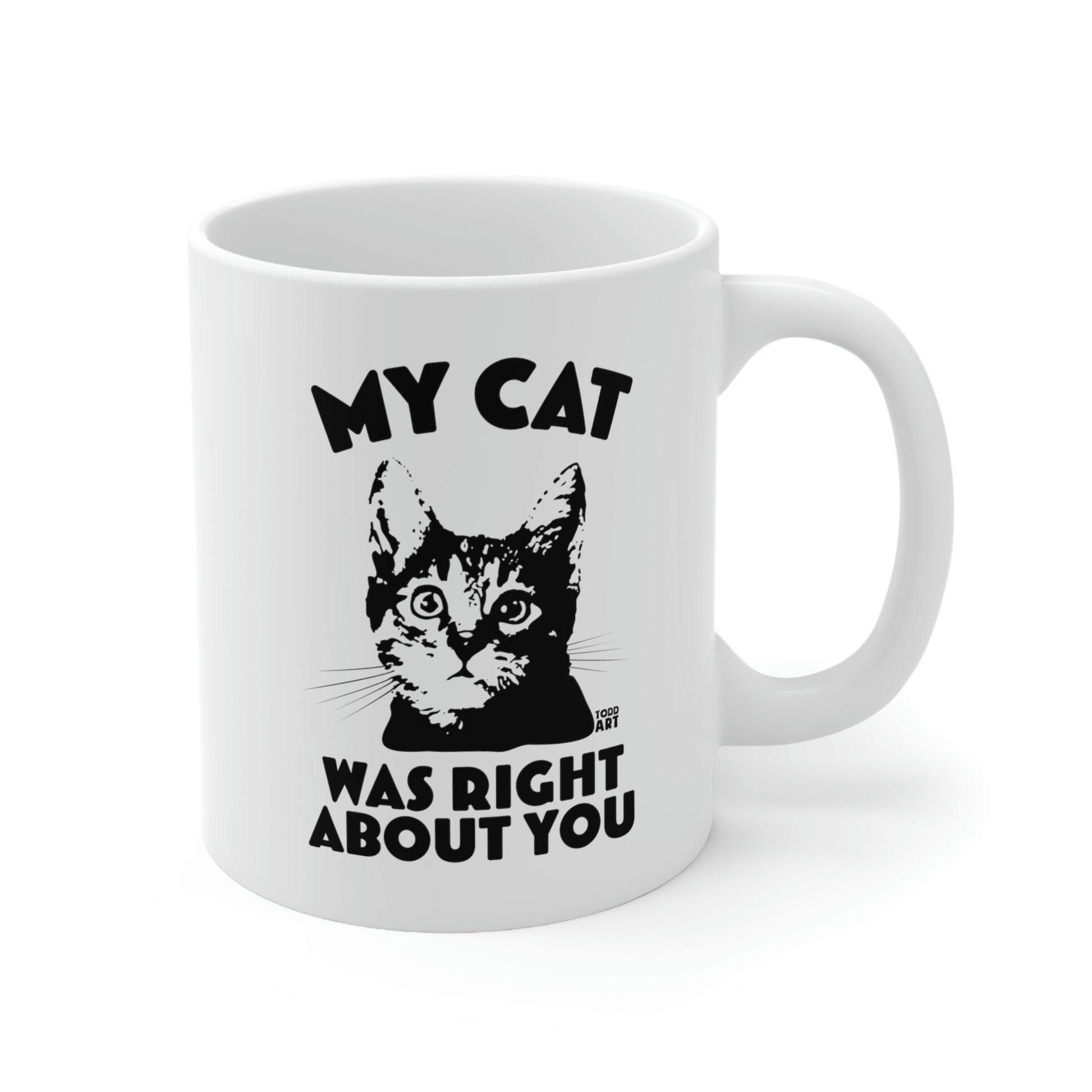 White ceramic mug with cat face and “My Cat Was Right About You” text – Pop Factory® funny judgmental cat coffee cup
