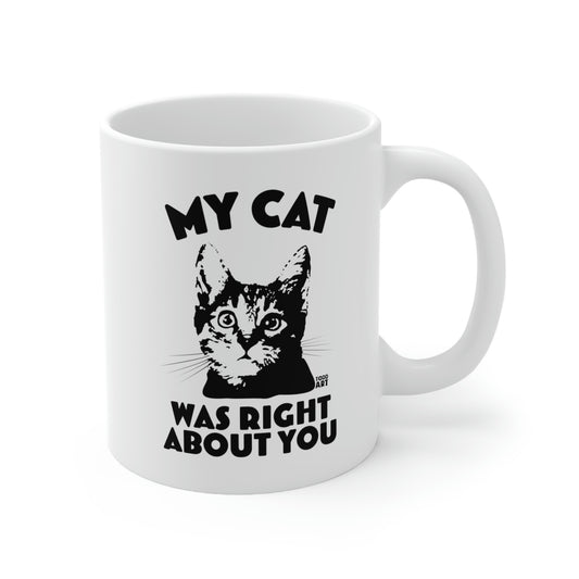 White ceramic mug with cat face and “My Cat Was Right About You” text – Pop Factory® funny judgmental cat coffee cup
