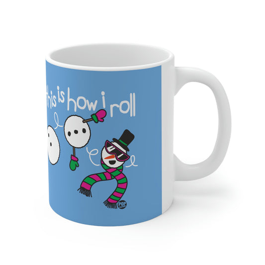 Ceramic mug with cartoon snowman rolling snowballs and “This Is How I Roll” text – Pop Factory® funny holiday coffee cup
