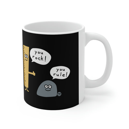 White ceramic mug with cartoon rock and ruler saying “you rock” and “you rule” – Pop Factory® funny pun coffee cup
